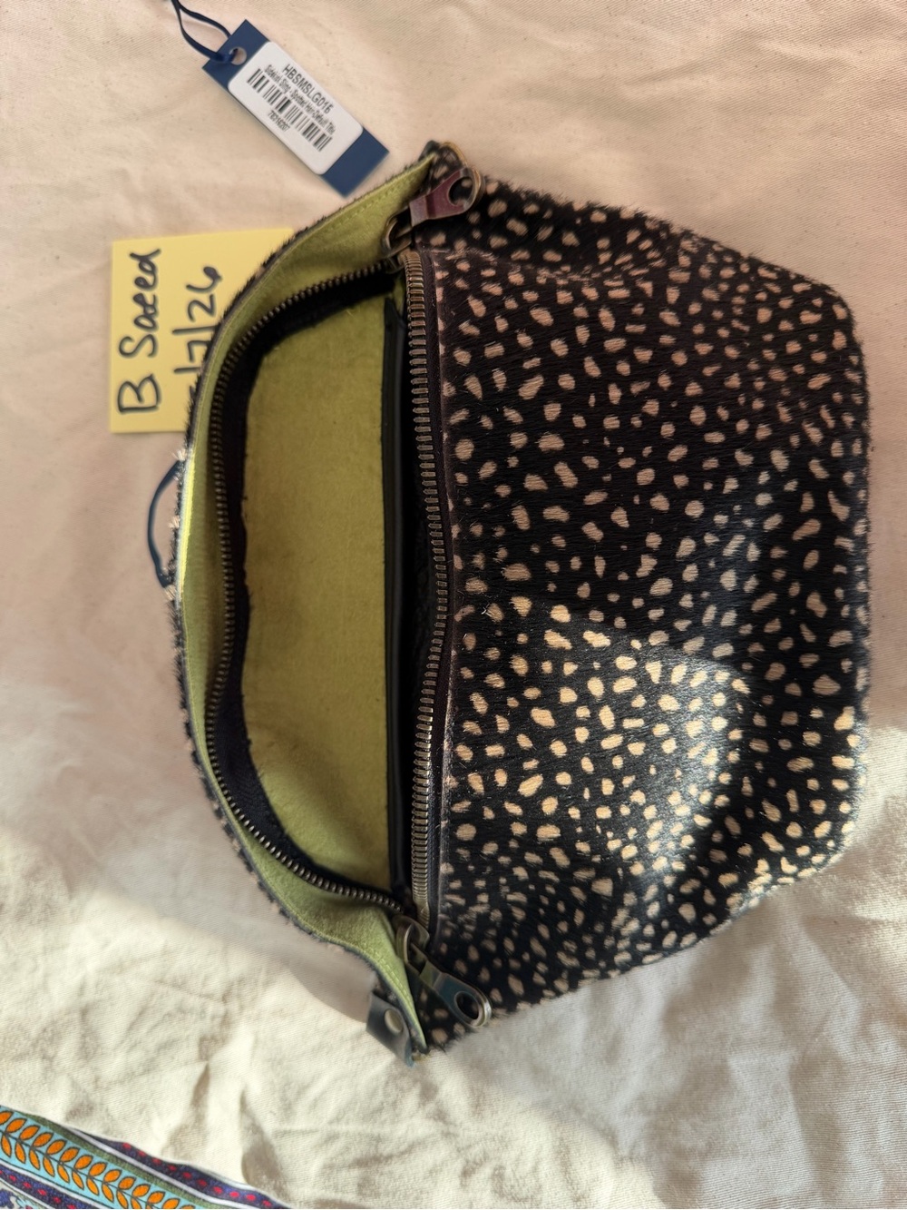 Parker Thatch spotted hair and black leather sidekick sling excellent used con